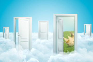 3d rendering of white clouds with open doorways and golden crown on blue background