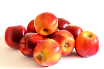 Fototapeta na wymiar Group of fresh red apples on the white background.