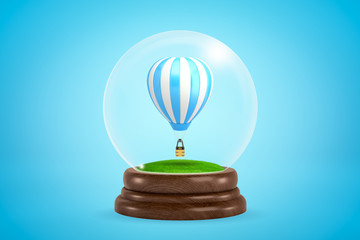 3d rendering of blue and white striped hot air balloon inside snow globe on light blue gradient background.