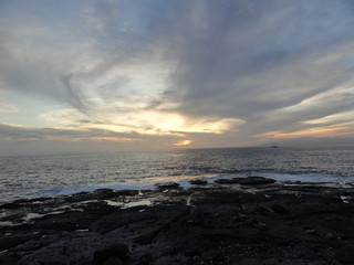 beautiful sunset over the ocean and coast of volcanic rocks, Tenerife