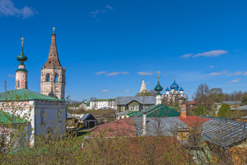 The paints of a spring sunny day. Roofs of the preserved old city block. The Golden Ring of Russia, Suzdal.