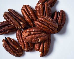 pecans on a white background