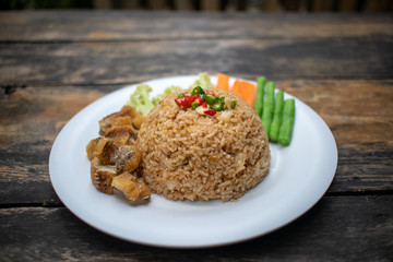 Fried Rice with Shrimp paste on white dish.