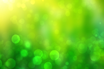 Obraz premium Abstract bright spring or summer landscape texture with natural green bokeh lights and yellow circular lights with sunshine and sun rays. Beautiful autumn background with copy space.