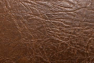 Leather material brown color texture, background, closeup