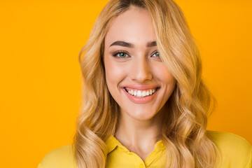 Portrait of happy woman smiling with widely smile