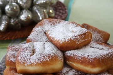 Strauben - Traditional Styrian donuts Krapfen by grandma, close up,
