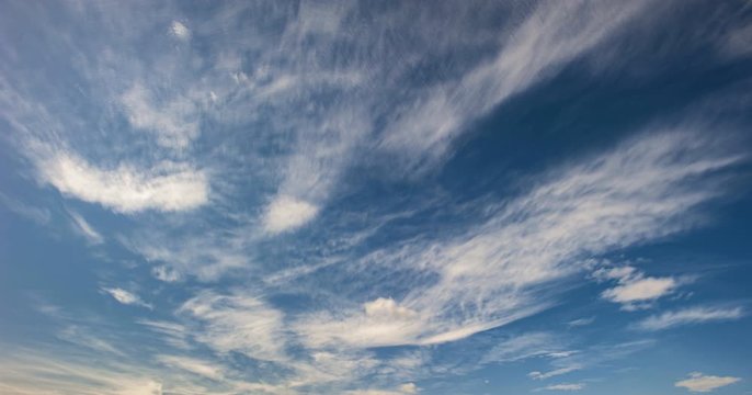timelapse of moving clouds on blue sky