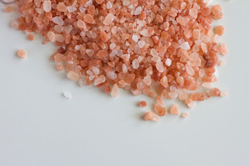 Cosmetology, Spa and beauty products, the concept of beauty, recreation and health. Himalayan bath salt. The industry of beauty and relaxation.  Bath of crystals in a transparent jar. space for text
