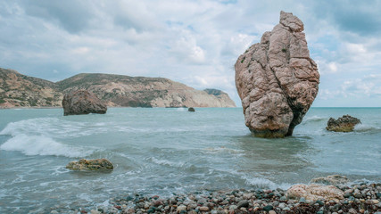 Fototapeta premium Big Stones in a beautiful mlra with waves