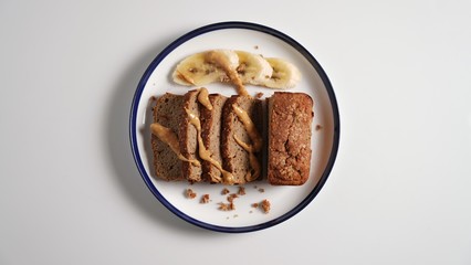 Sliced banana bread, peanut butter and banana