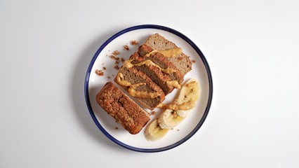 Sliced banana bread, peanut butter and banana