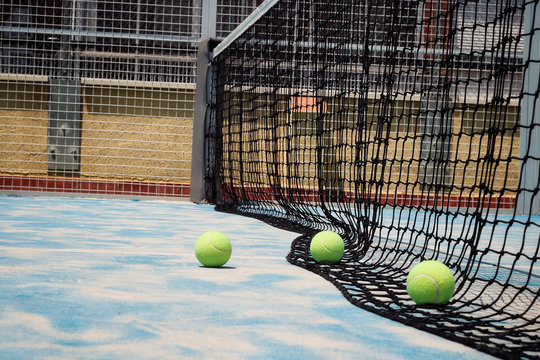 Balls of padel in the court.