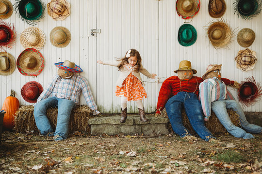 Autumn  fun in the Midwest with children jumping