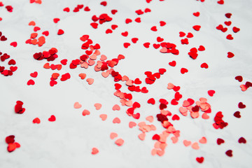 Valentine's day background - red paper herts on white background close-up