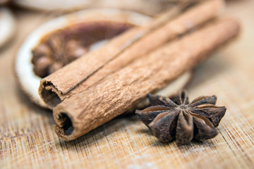 Dried citrus fruits with cinnamon, star anise on white background. Mulled Wine Ingredients.