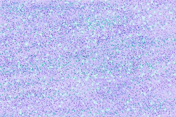 Small multi-colored dots on a light background.Texture for fabric. Multicolor drops in chaotic order.