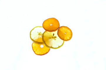 lemon and orange slice citrus fruit on light board isolated on white background