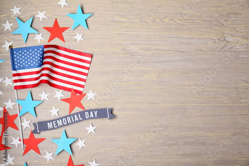 USA flag and stars on wooden background. Memorial Day celebration