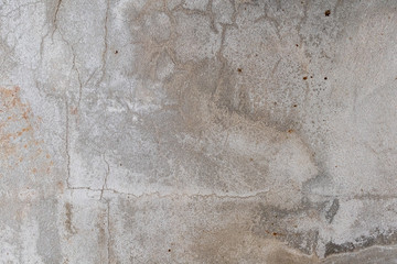 Cracked on the floor of an old concrete wall