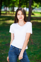 Young beautiful blonde girl with bare shoulders