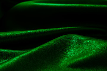 Texture cuir vert menthe noir plissé