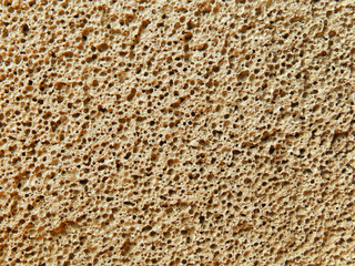 Volcanic pumice surface texture closeup. Natural background, wallpaper.