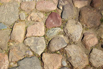 Old dry cobblestone surface, texture for background
