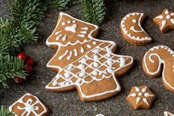 Homemade Christmas gingerbread cookies on a dark background
