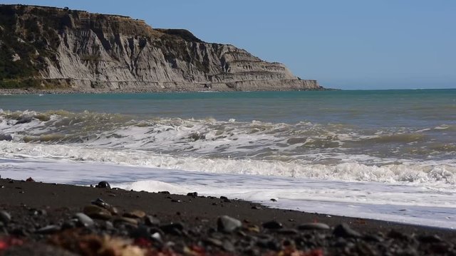 A big waves rolling on the beach in Cape Palliser