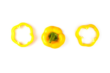 Collage set of fresh whole and sliced yellow bell peppers (paprika) isolated on a white background. View from above