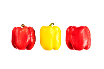 Collage set of fresh whole and sliced yellow bell peppers (paprika) isolated on white background. View from above