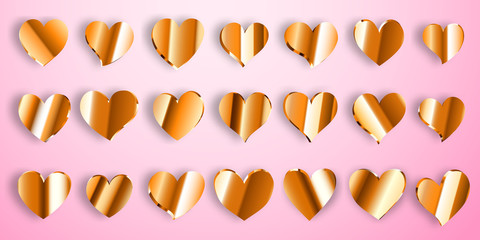 Set of shiny golden hearts with shadows on pink background