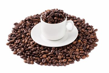 Coffee beans and a white cup isolated on white background