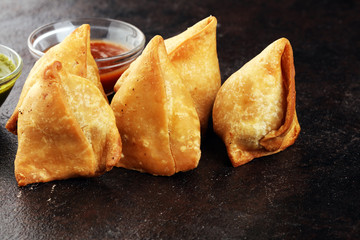 Vegetarian samsa or samosas.Indian special traditional street food fried punjabi samosa or Coxinha, Croquete and other Fried Brazilian Snacks