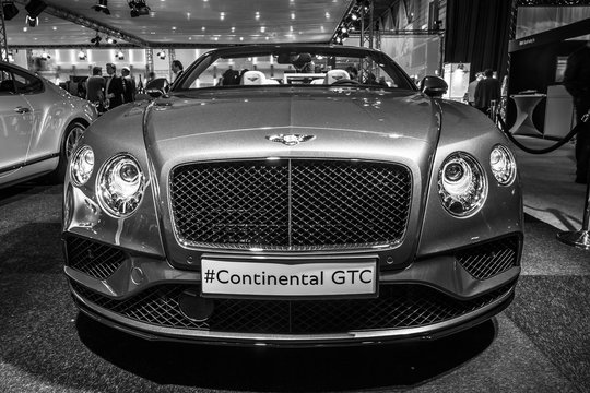 MAASTRICHT, NETHERLANDS - JANUARY 14, 2016: Luxury car Bentley Continental GTC V8S, since 2016. Black and white.  International Exhibition InterClassics & Topmobiel 2016