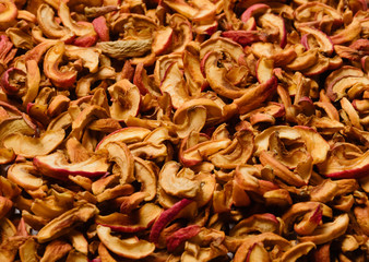 Sliced dried apples as food background. Selective focus