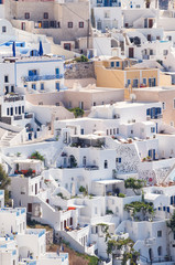 Classic whitewashed Mediterranean hillside view of the village of Oia on the Greek island of Santorini, Greece