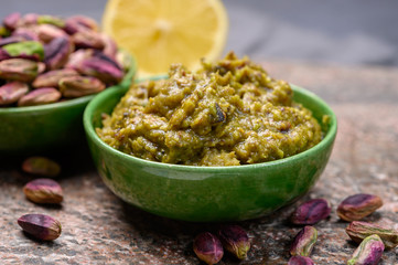 Pistachio pesto sauce made from high quality green pistachio nuts growing on slopes of Mount Etna in Bronte, Sicily, Italy