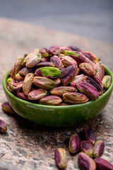 High quality green pistachio nuts growing on slopes of Mount Etna in Bronte, Sicily, Italy
