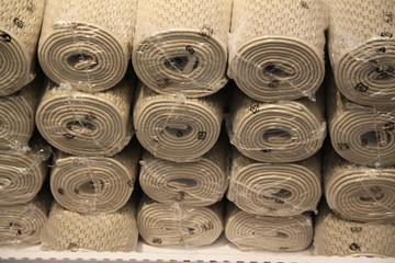 Pile of bathroom carpet rolls 