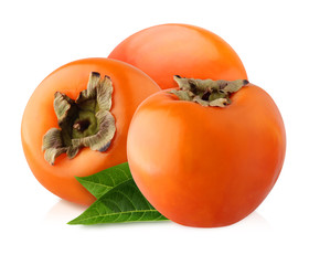 isolated persimmon. bunch, three whole fruit with a clipping path.