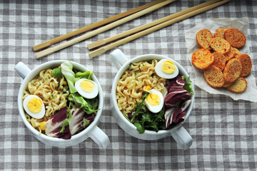 Noodles with salad and quail eggs. Healthy food. Diet food.