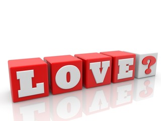 Love inscription with a question mark on red toy blocks