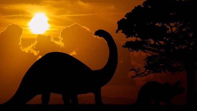 Dinosaurs in Prehistoric Landscape, Time Lapse at Sunset with Red Sun and Clouds, Extinction Concept