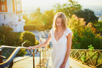 Young woman walking on Montmartre hill in Paris