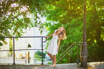 Beautiful young woman enjoying scenic view of Paris, France