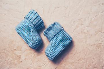 Baby boy booties. Shoes for newborns. Children's clothing.