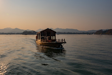 Tourist boat in Xihu lake Hangzhou China