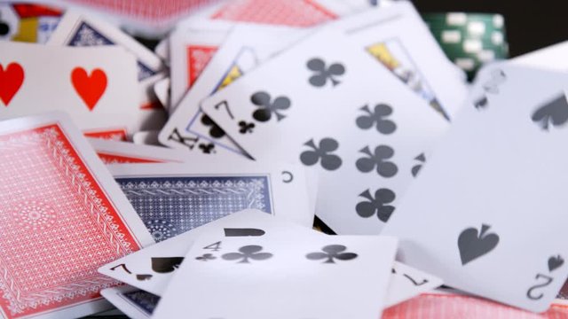 Playing Cards Fall On Casino Table in Slow Motion